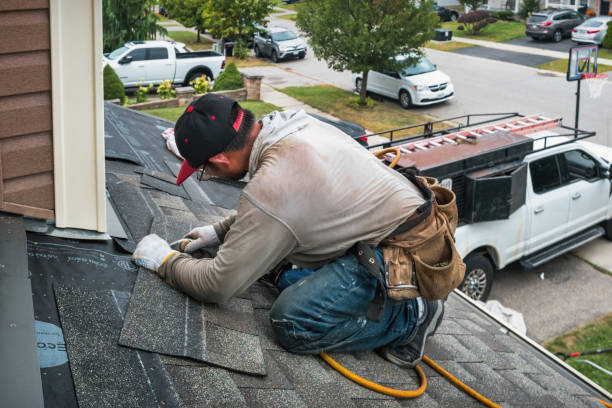 Professional Roofing technician working in Crosby, ND